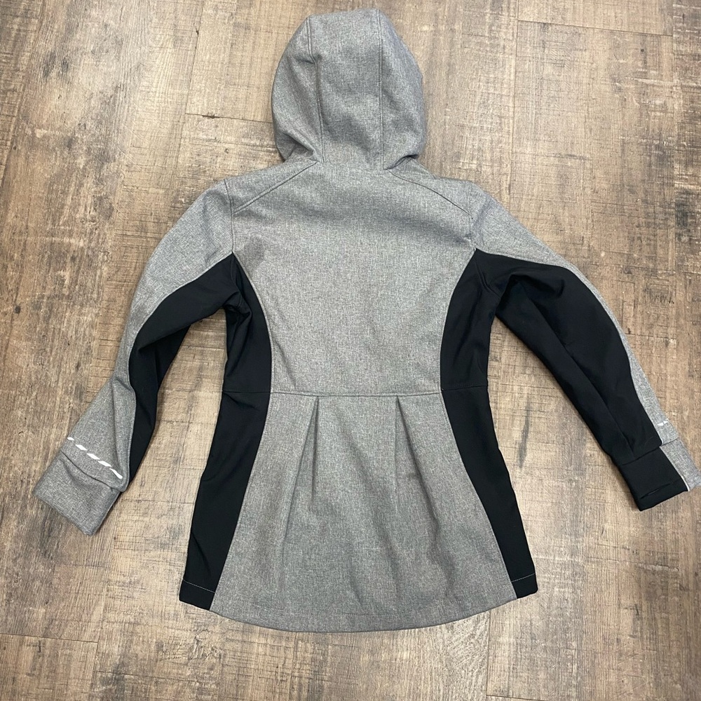 ZeroXposur rain resistant, snow resistant, princess pleaded in the back jacket